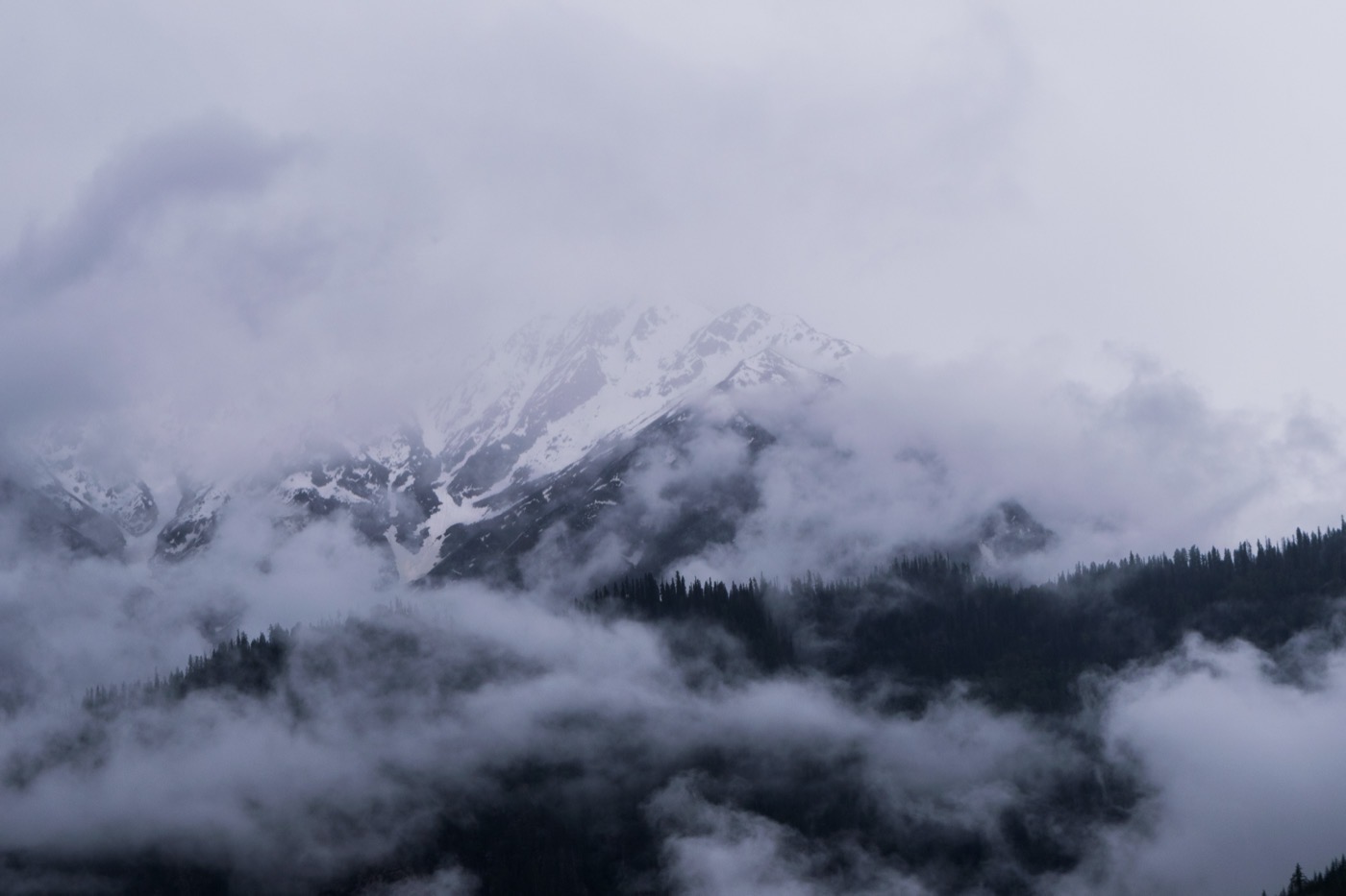 Cloudy snow mountain valley view